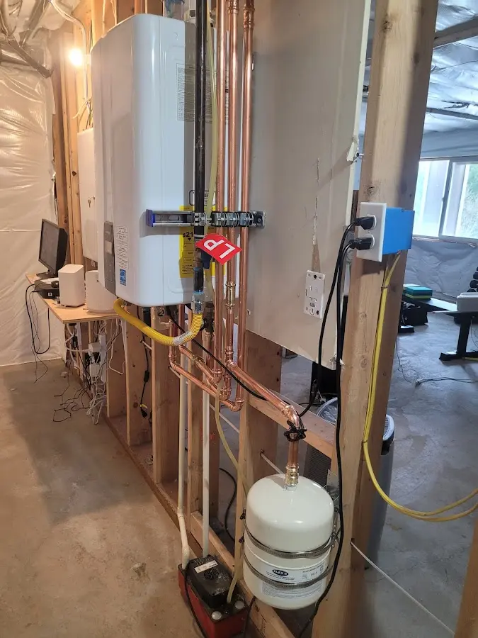 Licensed plumber repairing a kitchen sink in Three Rivers